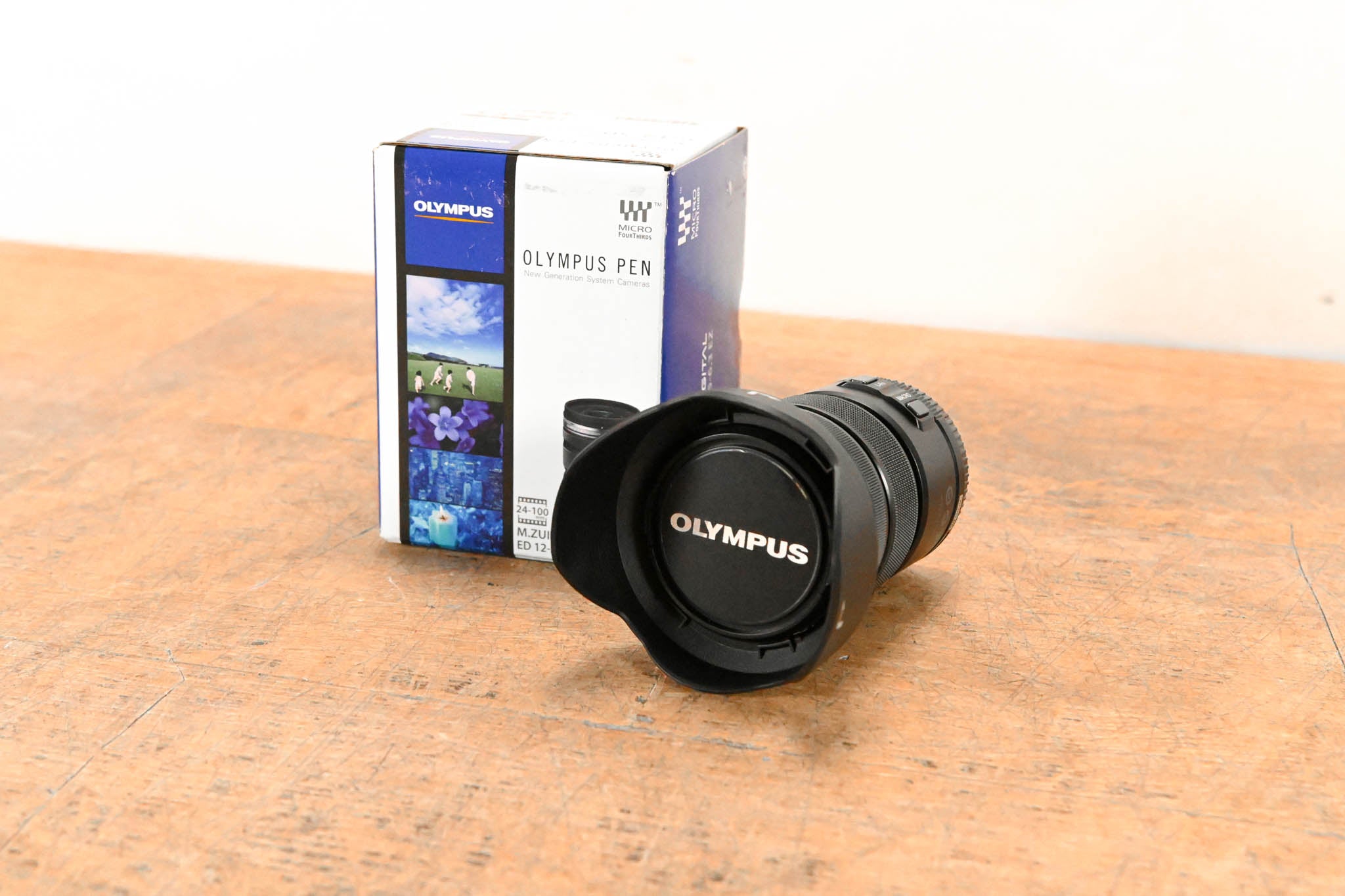 Olympus M.Zuiko Digital ED 12-50mm f3.5-6.3 EZ w/ JJC LH-J55C Lens Hood