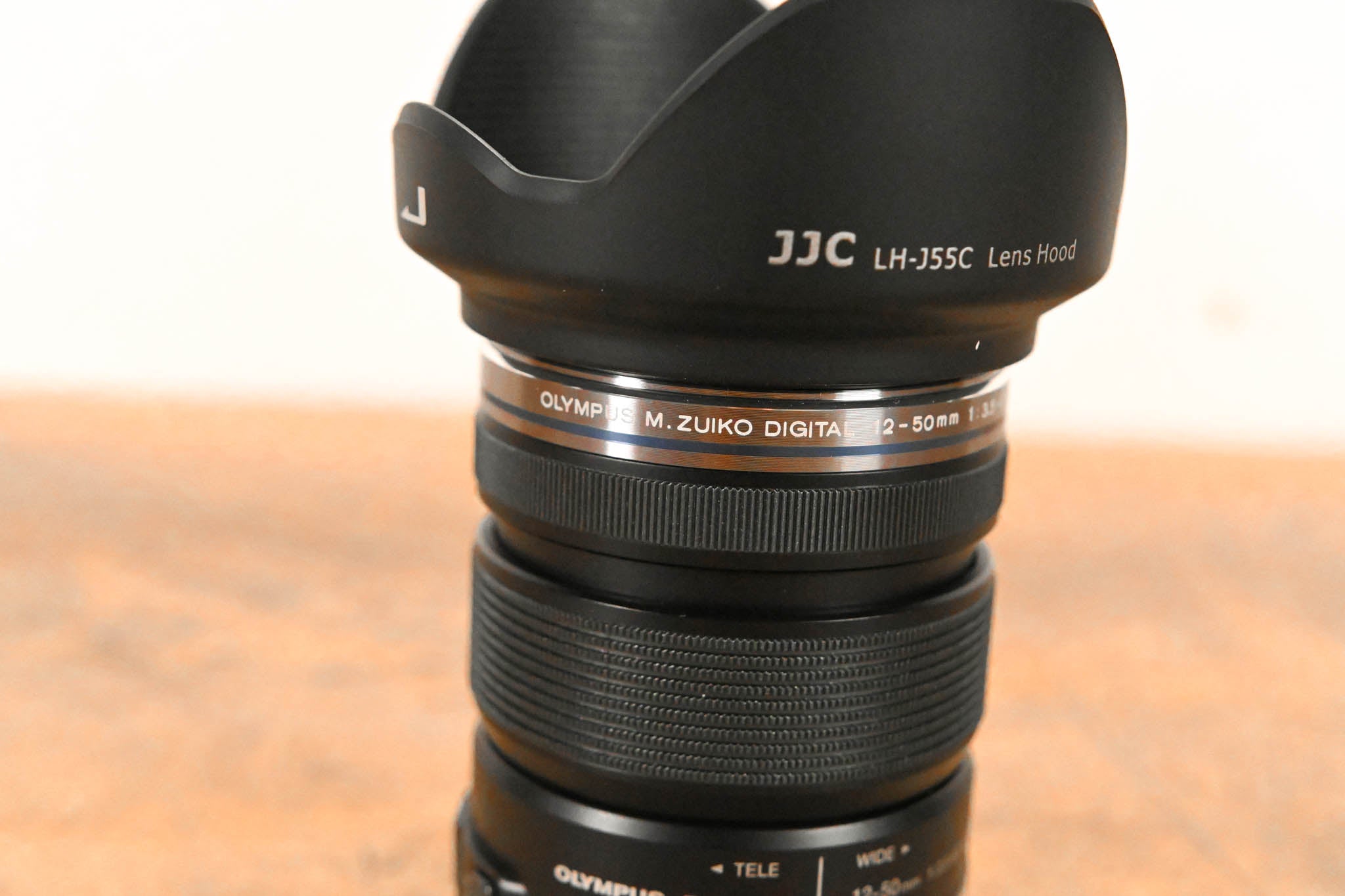 Olympus M.Zuiko Digital ED 12-50mm f3.5-6.3 EZ w/ JJC LH-J55C Lens Hood
