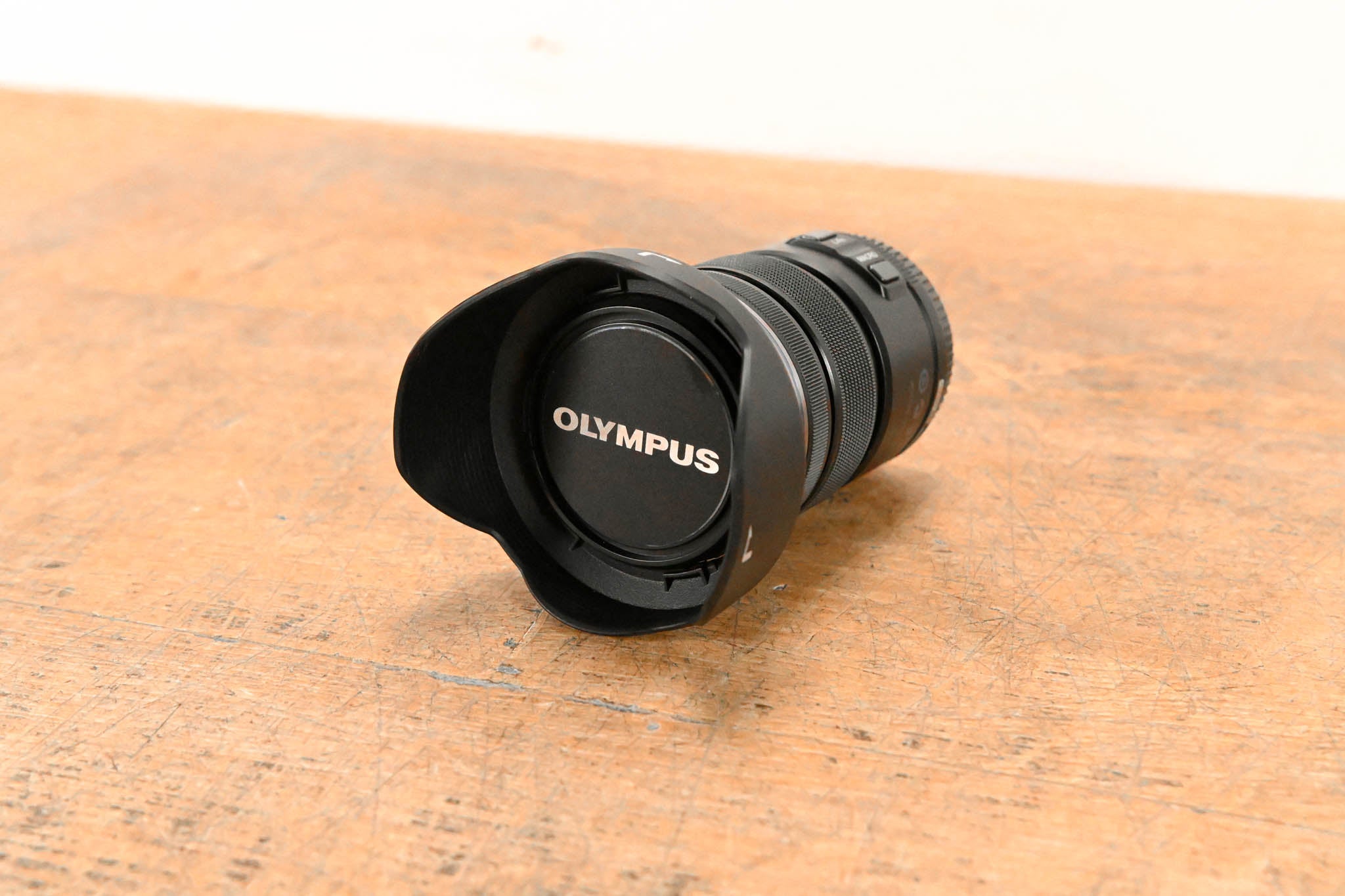 Olympus M.Zuiko Digital ED 12-50mm f3.5-6.3 EZ w/ JJC LH-J55C Lens Hood