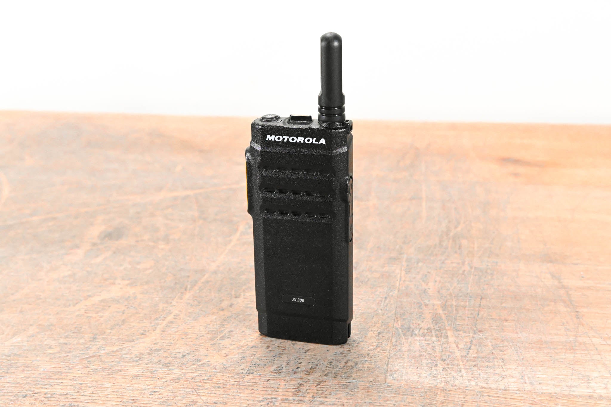 Motorola PMLN7093A Multi-Unit Charger with six SL300 Two-Way Radios