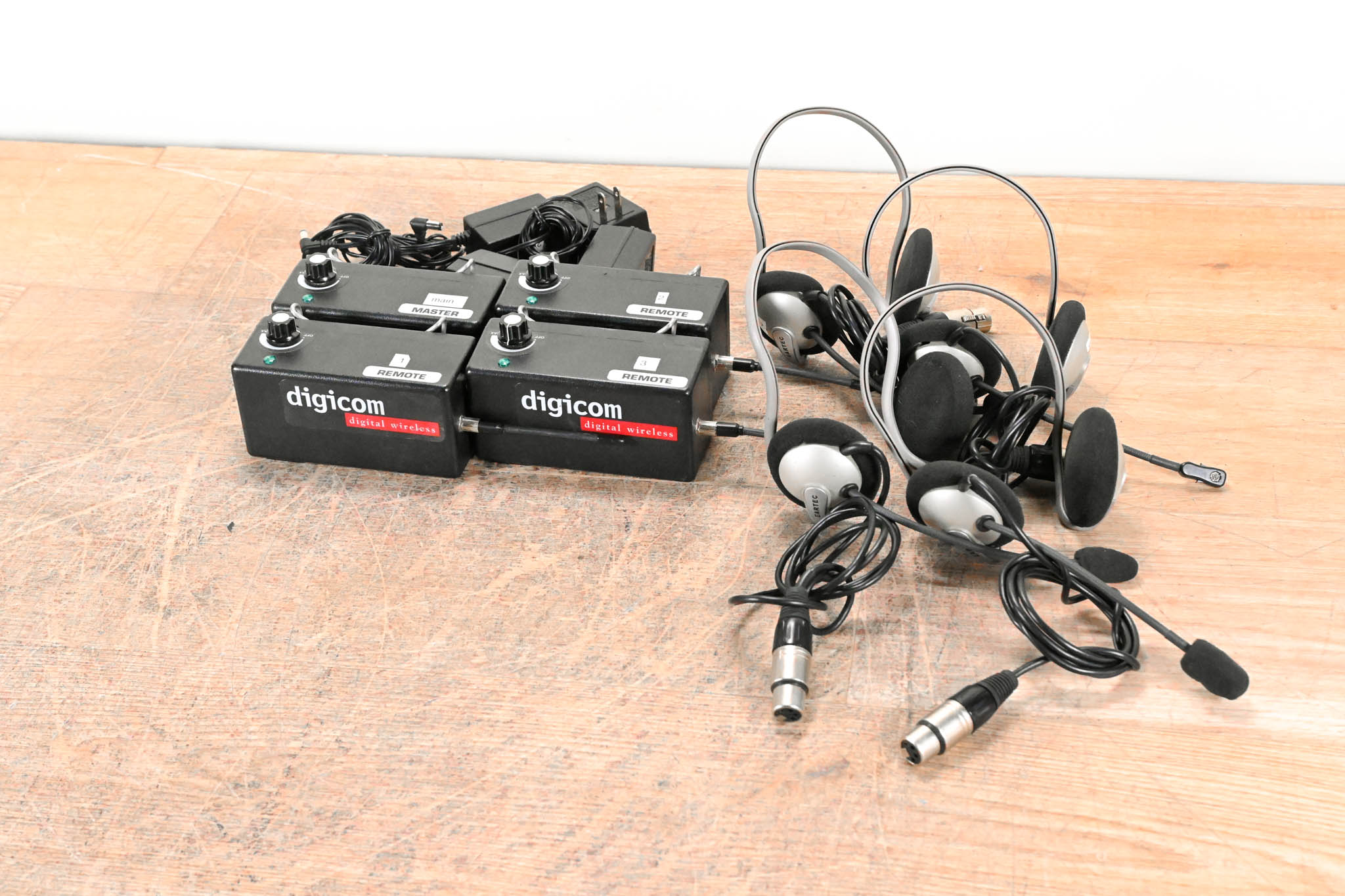 Eartec STX1000 Master Digicom Beltpack w/ three Remotes & four Headsets